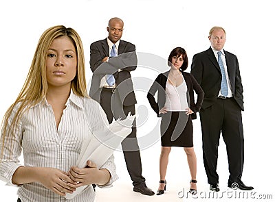 Latina business woman with her colleagues Stock Photo