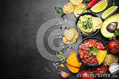 Latinamerican food party sauce guacamole, salsa, chips and ingre Stock Photo