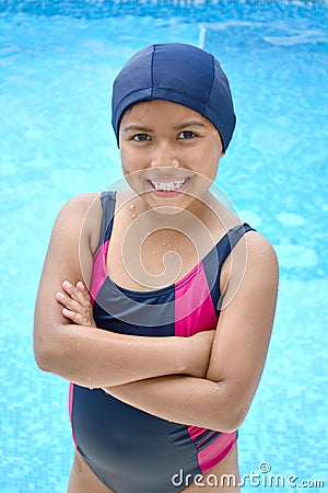 Latinamerican girl in the swimming pool. Stock Photo