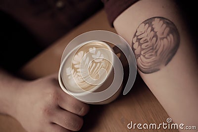 Latte art tattoo Stock Photo