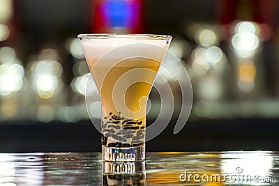 Latte glass on the bar in restaurant Stock Photo