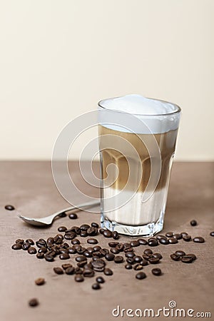 Latte macchiato with coffeebeans Stock Photo