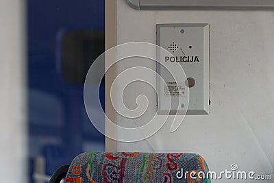 Latvia - 03.16.2020: interior view of train in Latvia. Police call button on the wall. Editorial Stock Photo