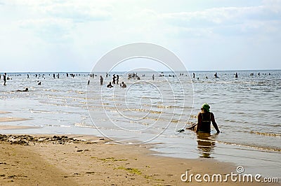 Latvia, Jurmala. Rest on the beach of the Gulf of Riga Editorial Stock Photo