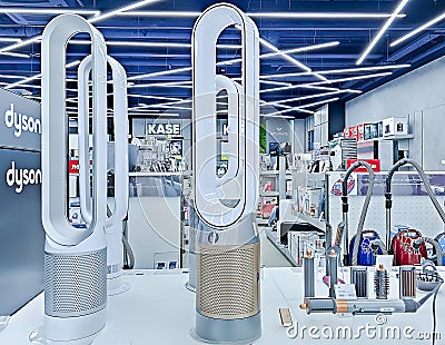 Modern bladeless fans and hair dryers on display at Dyson store in shopping mall, Riga Editorial Stock Photo