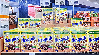 Nesquik Chocolate breakfast cereal for children on promotional stand Editorial Stock Photo