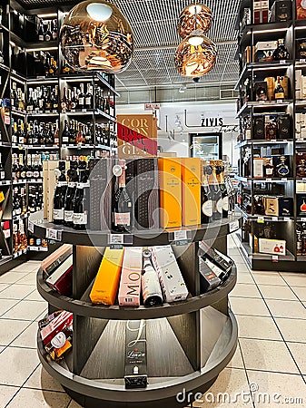 Large assortment of alcoholic beverages high quality of different manufacturers in STOCKMANN shopping mall Editorial Stock Photo