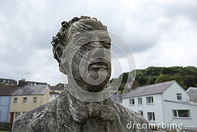 Laugharne, Wales, UK, July 2014, a view of Dylan Thomas carved statue Editorial Stock Photo
