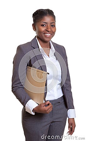 Laughing african business woman with file Stock Photo