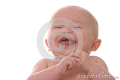 Laughing baby on blanket Stock Photo