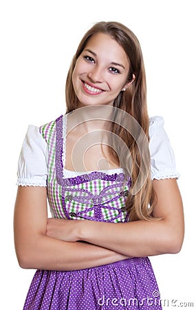 Laughing blond woman in a traditional purple dress Stock Photo