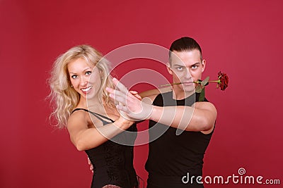 Laughing blondie and hot macho Stock Photo