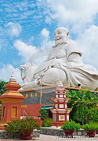 Laughing Buddha of Vinh Trang Pagoda, Vietnam Stock Photo