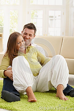 Laughing couple expecting baby Stock Photo