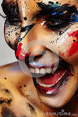 Laughing crazy Clown colorful Halloween Make-up Stock Photo