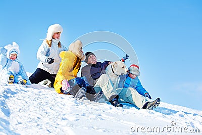 Laughing family in winter park Stock Photo