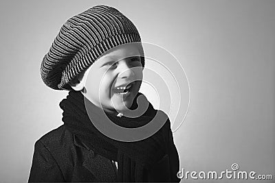 Laughing Little Boy in Cap. Stock Photo