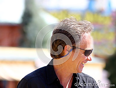 Laughing male tourist Stock Photo