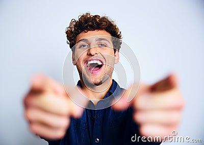Laughing man pointing at you Stock Photo