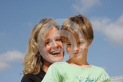 Laughing mother with smiling son Stock Photo