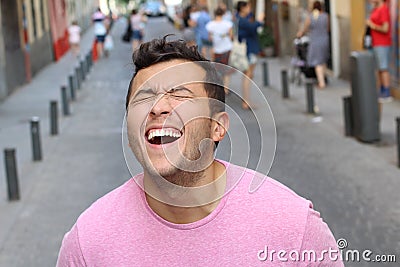 Laughing out load in the middle of the street Stock Photo