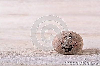 Laughing out loud emoticon Stock Photo