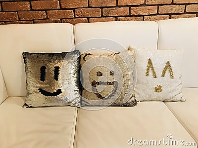 Laughing pillows on the couch for a nice day. Stock Photo