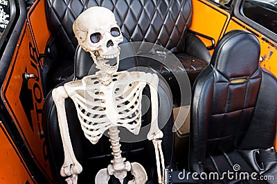 Laughing Skeleton in a Car Stock Photo