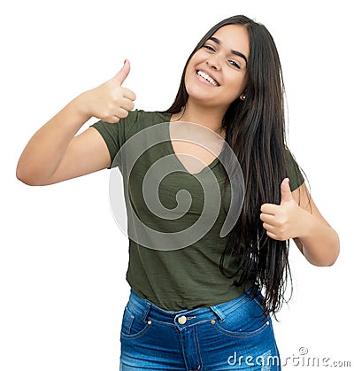 Laughing spanish young adult woman with casual clothes showing both thumbs up Stock Photo