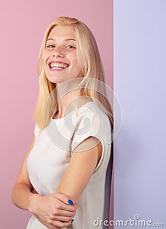 Laughing woman. Portrait of happy smiling girl. Cheerful young beautiful girl smiling laughing, studio isoalted Stock Photo