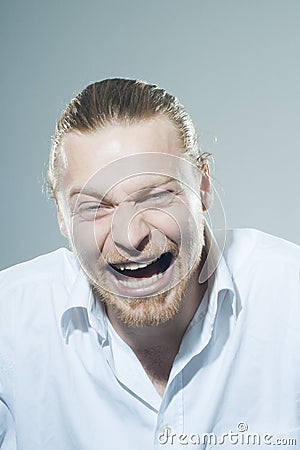 Laughing young man Stock Photo