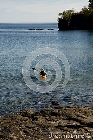 Launching a Kayak on Lake Superior Stock Photo