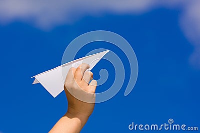 Launching a paper plane Stock Photo