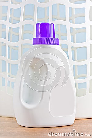 Laundry detergent and plastic basket Stock Photo