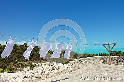 Laundry dries on a line in Providenciales, Turks and Caicos Stock Photo