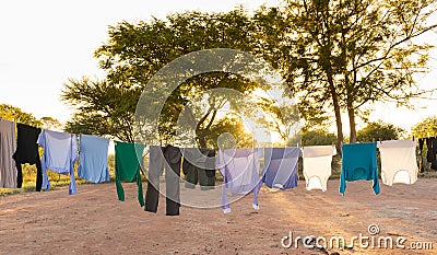 Laundry Drying on Outdoor Clothes Line Stock Photo