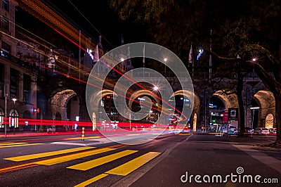 Lausanne, Vaud , Switzerland - 01.10.2021: Car light trails over Lausanne city at night Editorial Stock Photo
