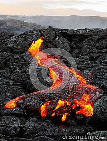 Hawaii - lava emerges from a column of the earth Stock Photo