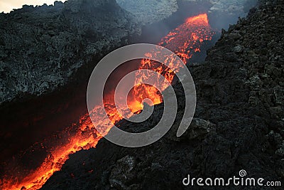 Lava flowing from Etna Stock Photo