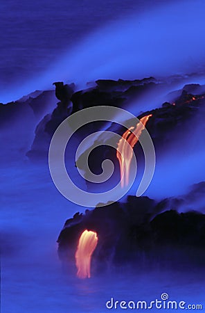 Lava flowing into the sea Stock Photo
