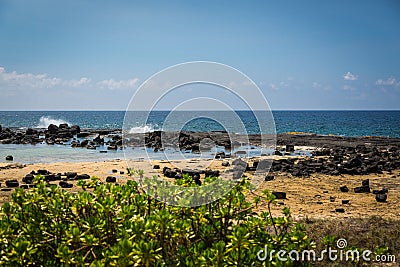 Lava Rock and Sand Beach, Kona Hawaii Stock Photo