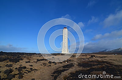 Lava Rocks in the Fields Surrounding Malarrif Lighthouse Stock Photo