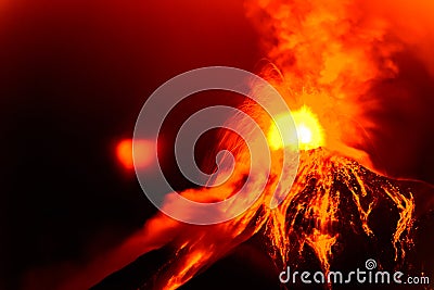 Lava spurts from erupting Fuego volcano in Guatemala Stock Photo