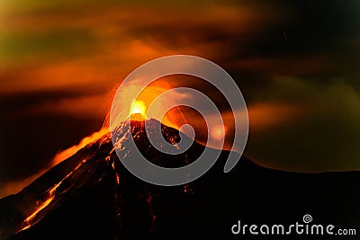 Lava spurts from erupting Fuego volcano in Guatemala Stock Photo