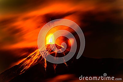 Lava spurts from erupting Fuego volcano in Guatemala Stock Photo