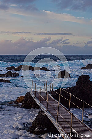 Lava stones on the beach of Piscinas Naturais Biscoitos. Atlantic Ocean. Terceira Azores, Portugal. Stock Photo