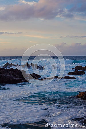 Lava stones on the beach of Piscinas Naturais Biscoitos. Atlantic Ocean. Terceira Azores, Portugal. Stock Photo