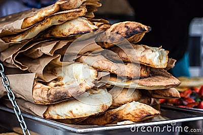 Lavash, Bakery Products fresh pastry sells pita market wheat tortillas close-up Caucasian kitchen Lavash Pita or Arabic bread trad Stock Photo