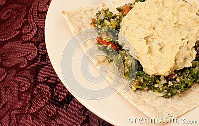 Lavash with Hummus and Tabbouleh Stock Photo