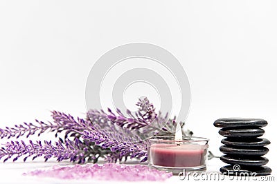 Lavender aromatherapy Spa with rock and candle. Thai Spa relax Treatments and massage white background. Stock Photo